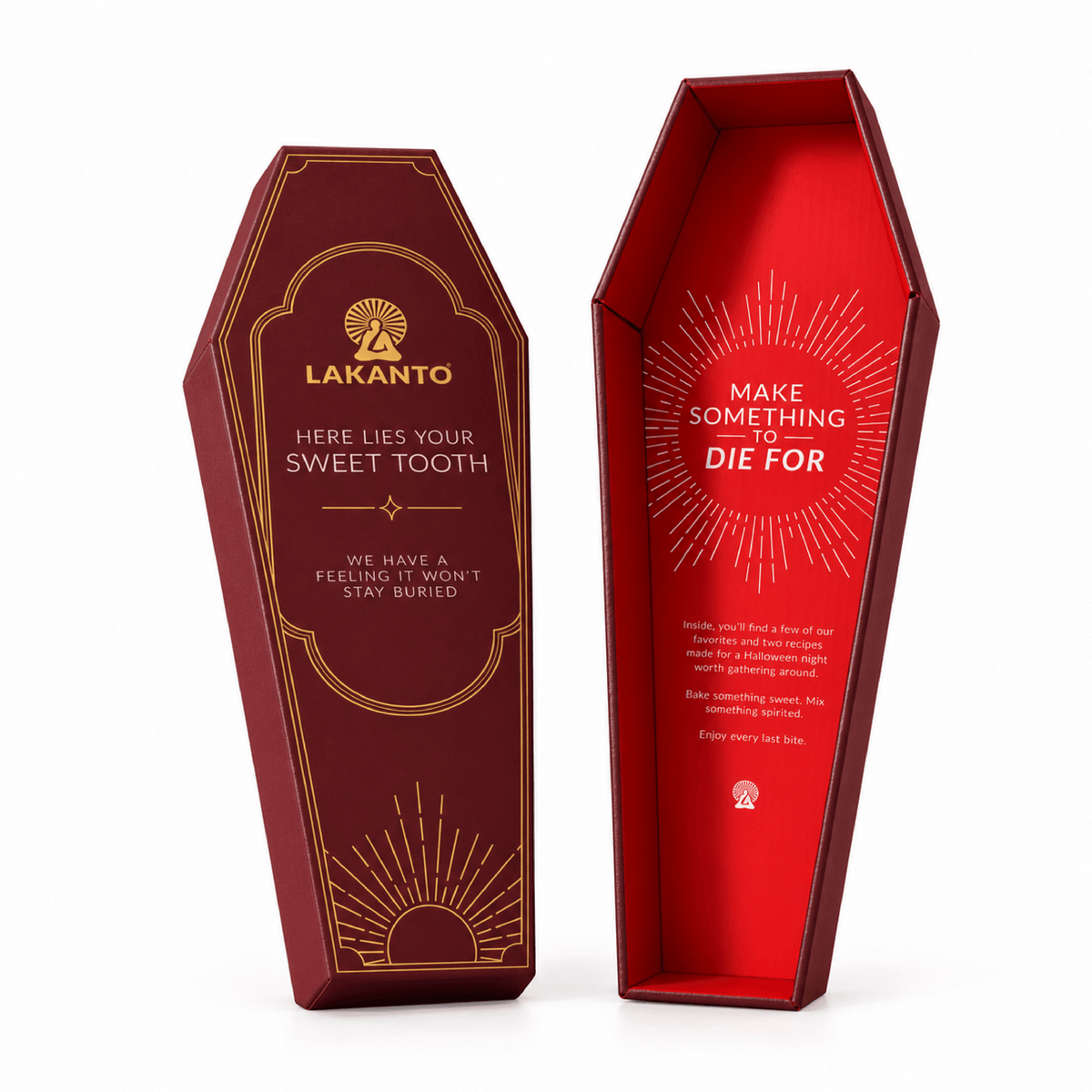 Two coffin-shaped product boxes on a white studio background. One box is shown from the front with a dark red exterior, gold sunburst details, and the brand name LAKANTO.