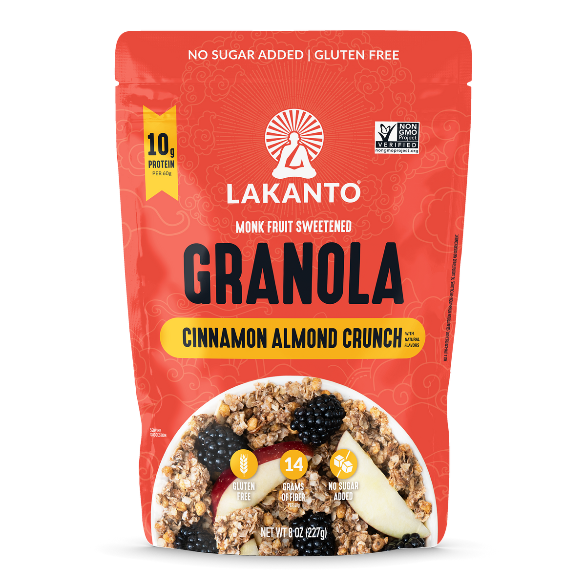 A red stand-up pouch of Lakanto Monk Fruit Sweetened Granola in Cinnamon Almond Crunch flavor, shown on a plain white background. The package features a bowl photo of granola with fruit and includes text such as 'No Sugar Added | Gluten Free' and '10g Protein Per Scoop'.